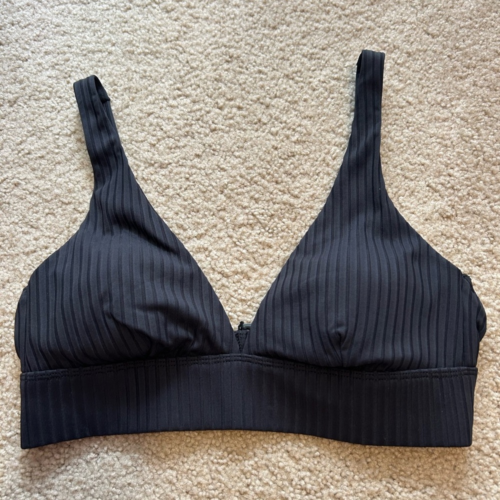 Ladies Black padded bikini top with Adjustable straps. Fits like a Sz Small.